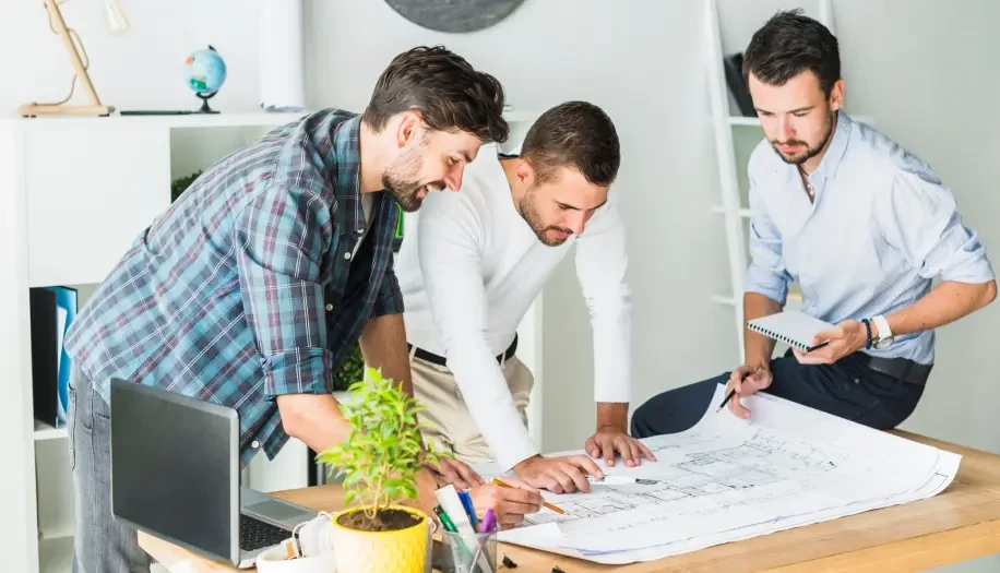 Acquaint Softtech team reviewing 1200+ project data to identify dev team quality signals